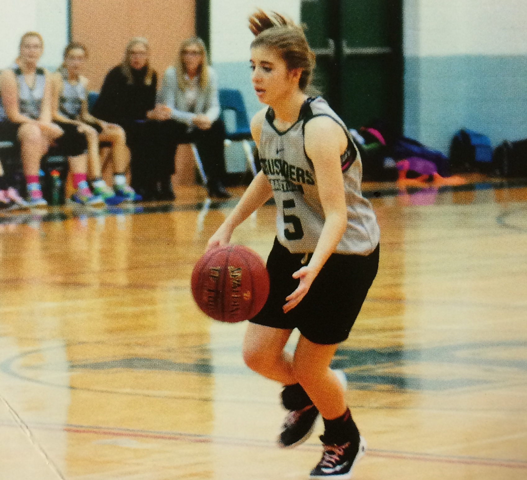 Girl playing basketball