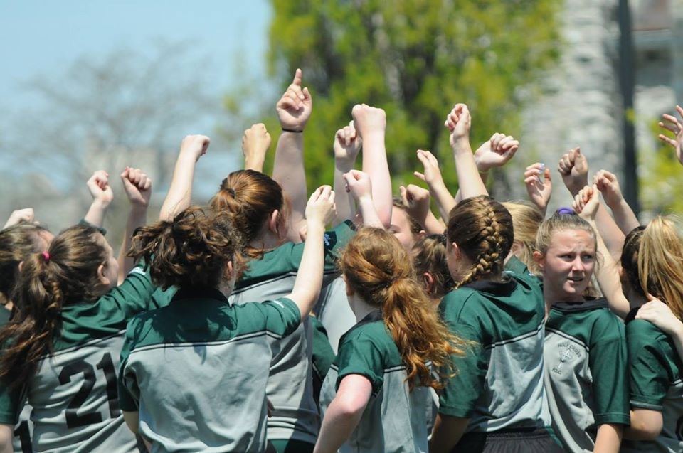 Rugby players cheering