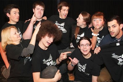 Holy Cross Improv team members mug for the camera.jpg