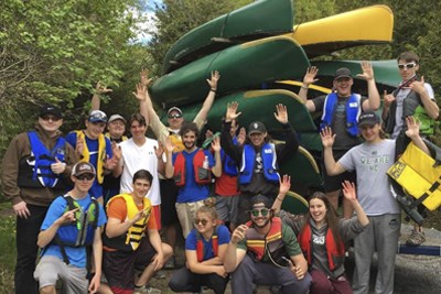 Enviro group with canoes.jpg