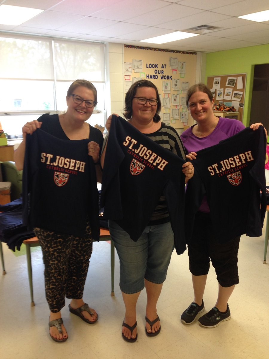 Parent Council Members holding Spirit Wear.jpg