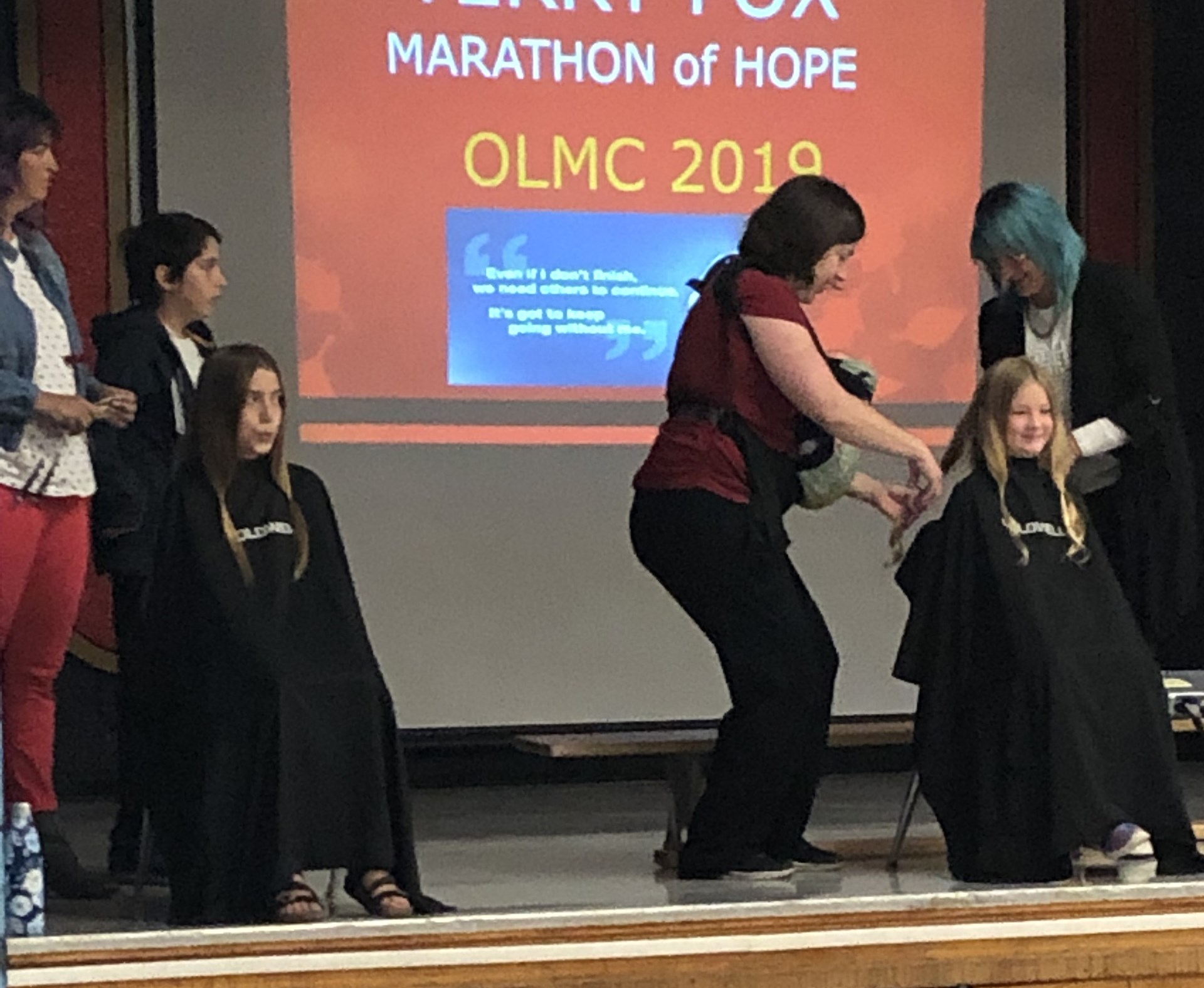 Cutting hair for Marathon of Hope.