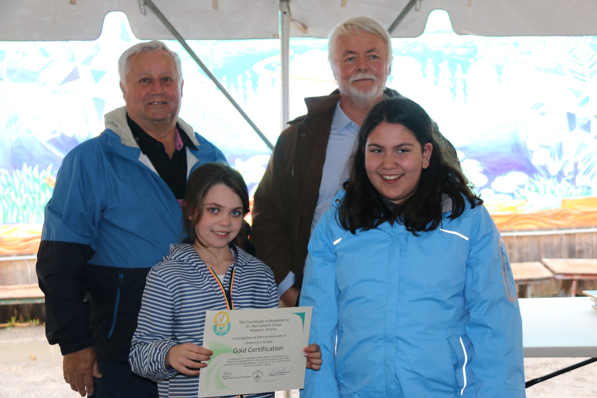 Students recieving Gold status certificate.